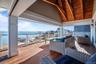 Wooden deck featuring a water view