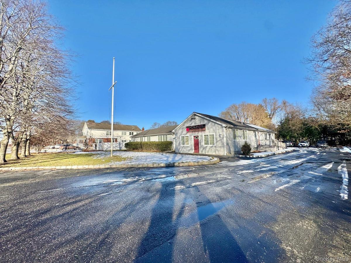 View of asphalt road with a residential view