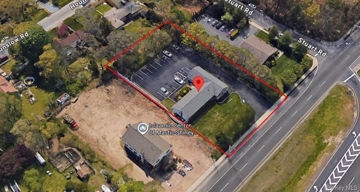 Aerial view of property's location featuring property parcel outlined