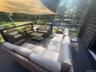 Wooden terrace featuring outdoor lounge area and an outdoor pool