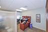 Home office with a drop ceiling