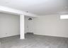 Basement featuring baseboards