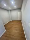 Empty room featuring wood finished floors and recessed lighting