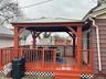 Wooden terrace with a gazebo
