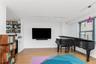 Dining area featuring rail lighting and light wood-type flooring