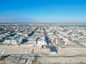 Aerial view of residential area with a large body of water