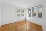 Unfurnished room featuring hardwood / wood-style flooring and baseboards