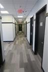 Hallway with concrete flooring