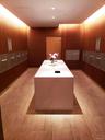 Bathroom with mail area, vanity, wood walls, and recessed lighting