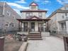 Traditional style home featuring covered porch