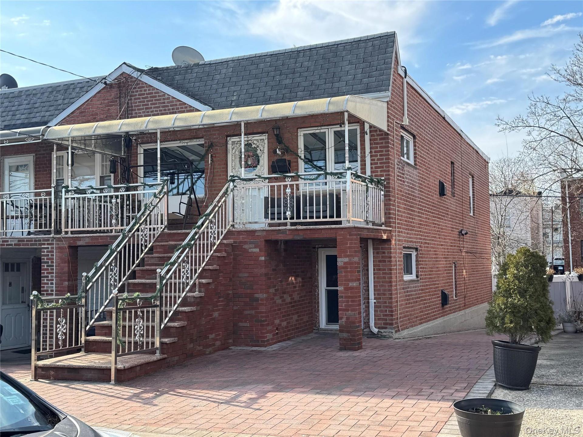 View of building exterior featuring stairway