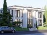 View of front of house featuring stucco siding