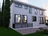 Back of house featuring stucco siding and entry steps