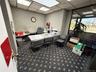 Home office featuring a paneled ceiling and carpet flooring