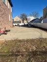 View of fenced backyard