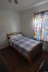 Bedroom with baseboards