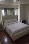 Bedroom with wood-type flooring