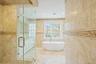 Bathroom featuring a freestanding bath, a shower stall, tile walls, and recessed lighting