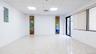 Spare room featuring a drop ceiling and electric panel