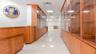 Corridor featuring a paneled ceiling