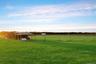 View of yard with shelter for livestock