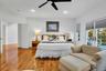Bedroom featuring light wood-style floors, access to outside, ceiling fan, and recessed lighting