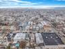 View of property location with nearby urban area