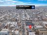 Aerial view of property's location featuring nearby urban area