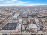 Aerial view of property's location featuring nearby urban area