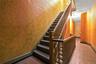 Staircase featuring baseboards