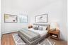 Bedroom with light wood-style flooring