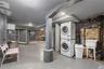 Laundry room featuring estacked washer and dryer