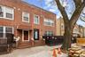 Traditional home with brick siding