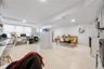 Office area featuring finished concrete floors and a wall unit AC