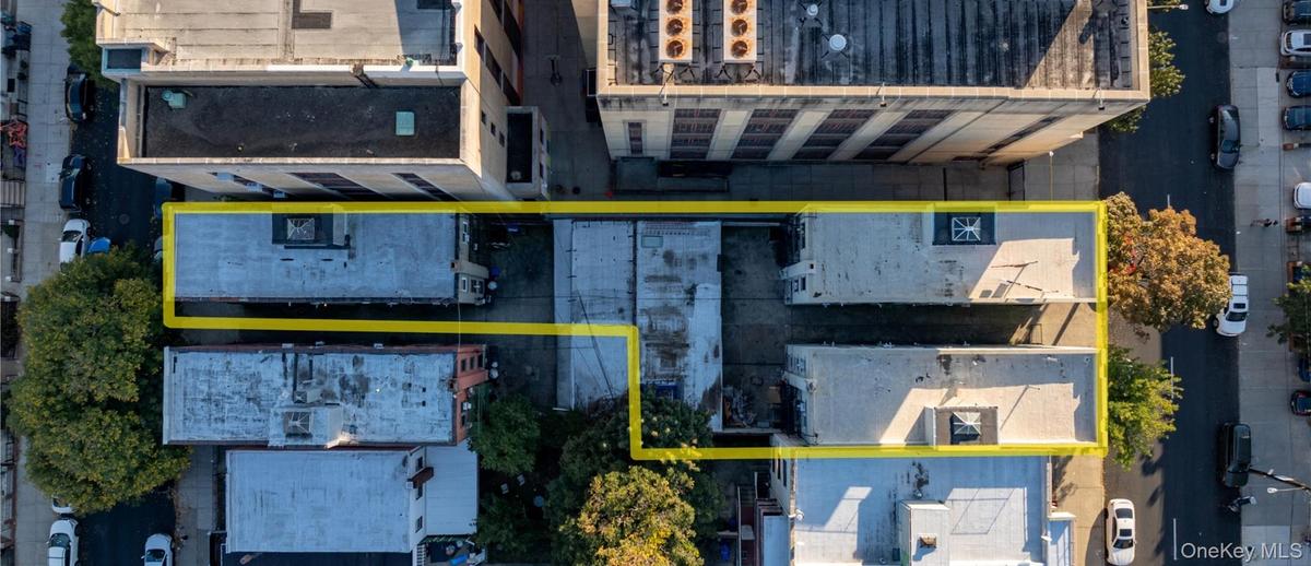 Aerial overview of property's location with property parcel outlined
