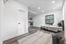 Bedroom featuring dark wood-style floors and recessed lighting