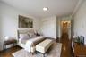 Bedroom with a closet and baseboards
