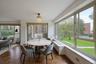 Dining space with a chandelier and healthy amount of natural light
