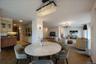 Dining space with a chandelier and recessed lighting