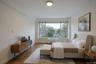 Bedroom featuring baseboards