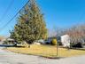 View of front of house featuring a front lawn