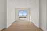 Empty room featuring light wood-style flooring and recessed lighting