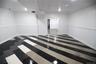 Empty room featuring baseboards