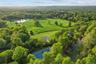 Tennis court, pool, entertaining pavilion and one of two ponds highlighted on the property. Subdivision possible; 2 acre zoning (RR) applies