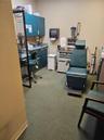 Office space featuring carpet floors and a sink