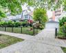 The detached 2-car garage and long private driveway offer plenty of parking