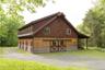 6 Stall horse barn with wash stall, storage and carriage house apartment with kitchen and bath.
