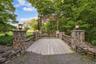 Custom, newly rebuilt private bridge with gate