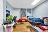 Bedroom with a drop ceiling and hardwood / wood-style floors