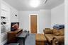 Carpeted office space featuring baseboards